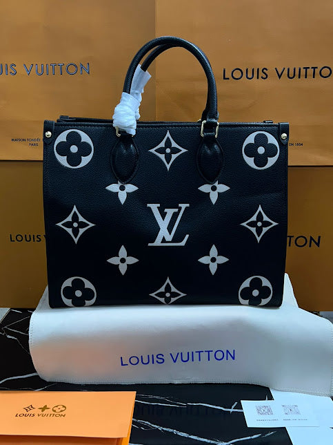 Louis Vuitton Negro con Blanco Piel