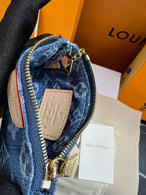 Louis Vuitton Monedero Mezclilla y Piel