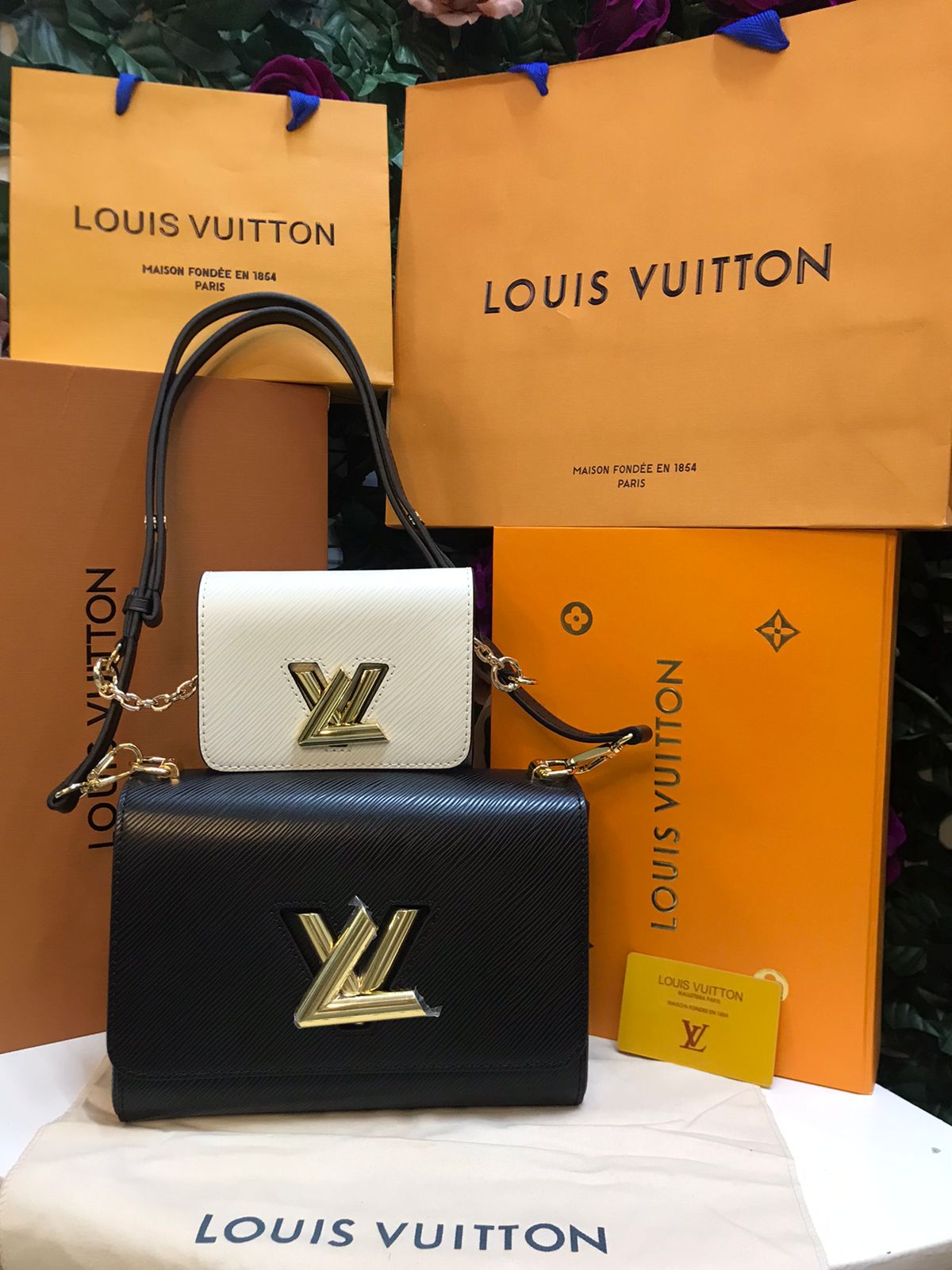 Louis Vuitton Negro con Monedero Blanco Piel