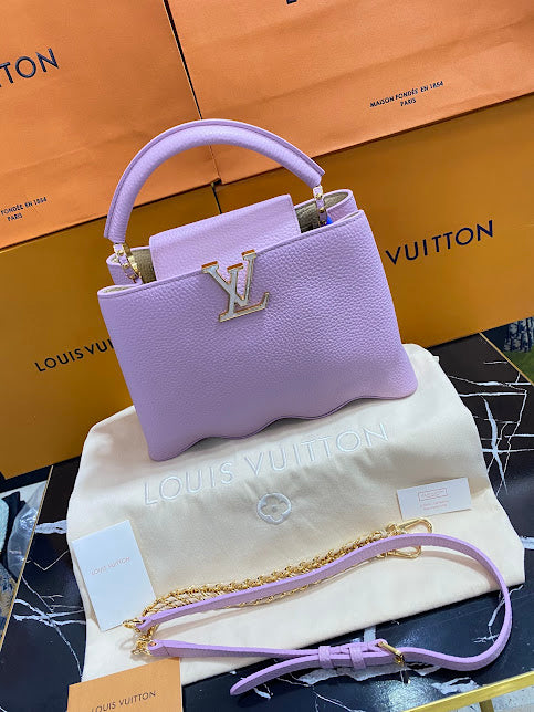 Louis Vuitton Lila Piel