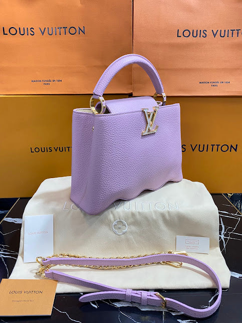 Louis Vuitton Lila Piel