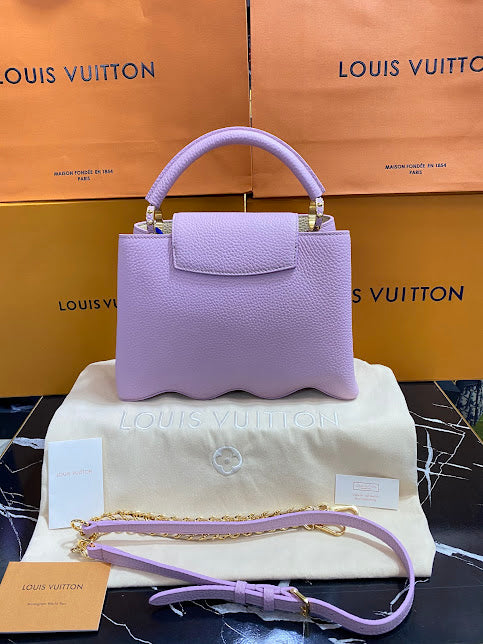 Louis Vuitton Lila Piel