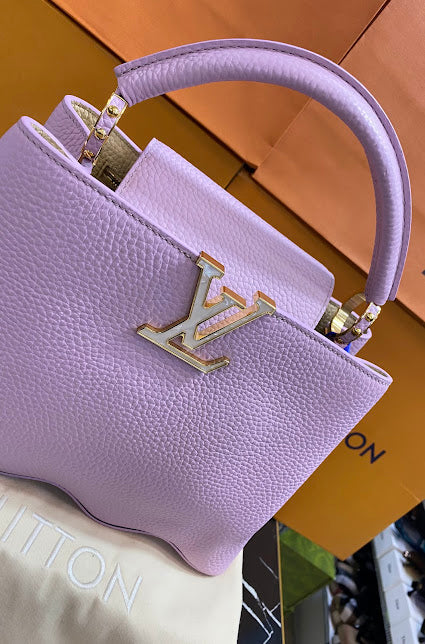 Louis Vuitton Lila Piel