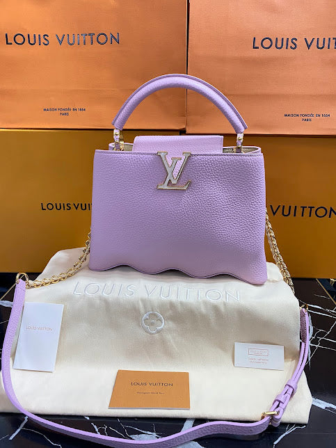 Louis Vuitton Lila Piel