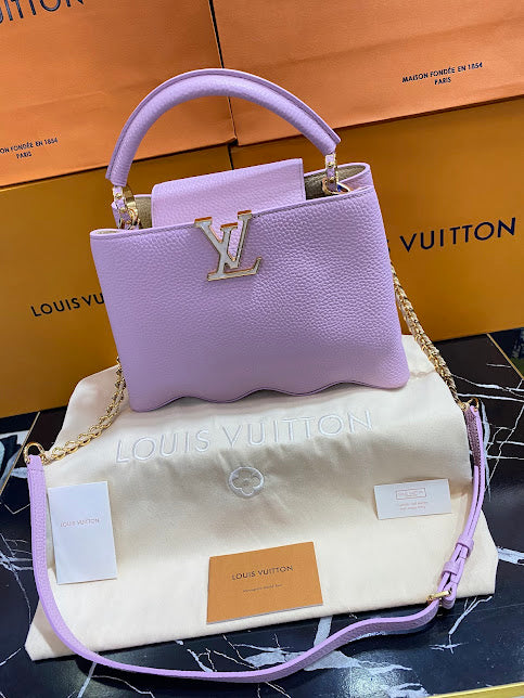 Louis Vuitton Lila Piel