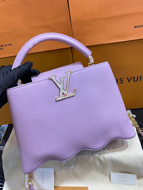 Louis Vuitton Lila Piel