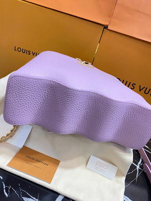 Louis Vuitton Lila Piel