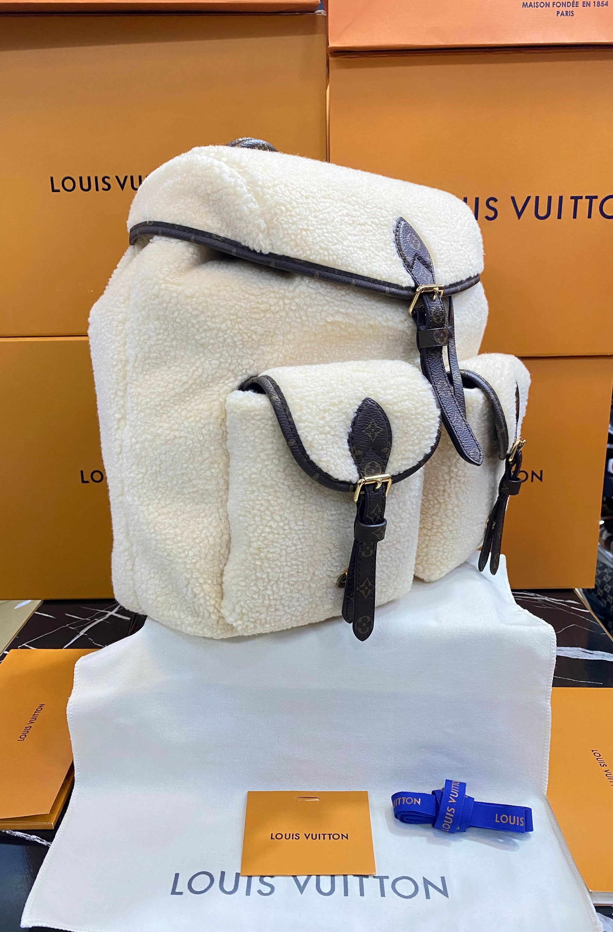 Louis Vuitton Beige Lana con Piel