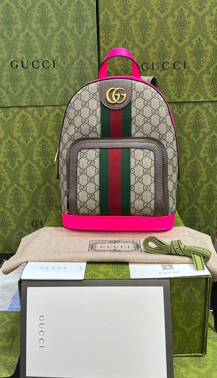 Gucci mochila con borde morado