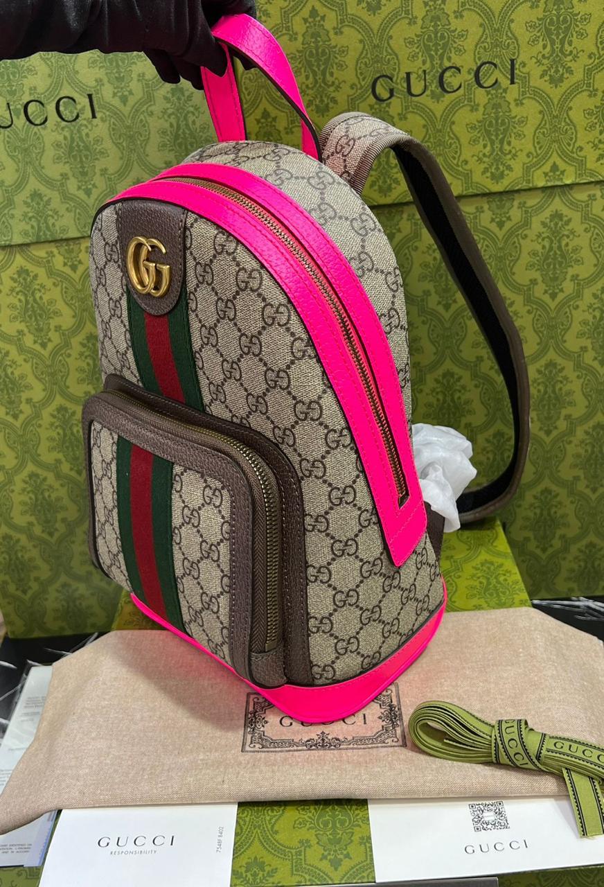 Gucci mochila con borde morado