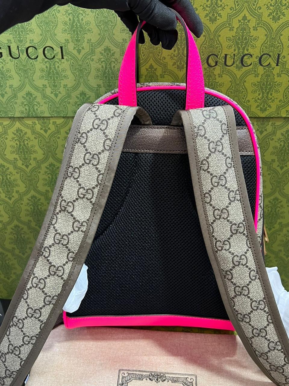 Gucci mochila con borde morado