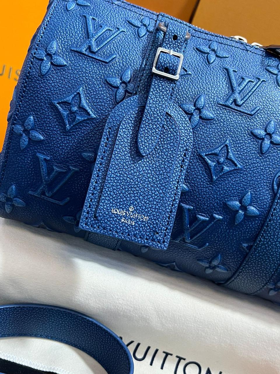 louis vuitton piel color azul marino