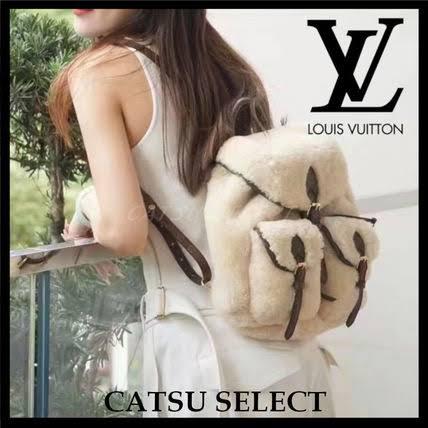 Louis Vuitton Beige Lana con Piel