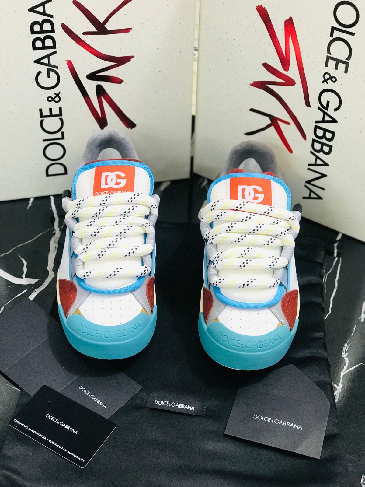 Dolce Gabbana tenis color azul y naranja Caballero