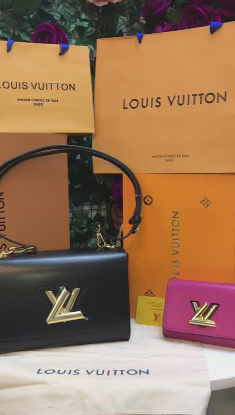 Louis Vuitton Negra con Monedero Rosa Piel