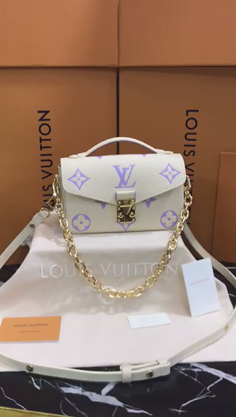 Louis Vuitton Blanco Lila Piel